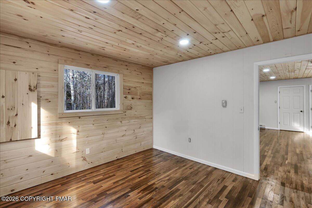 309 Selig Road Pocono Lake, PA 18347 - Photo 14 of 25 a view of a hallway with wooden floor