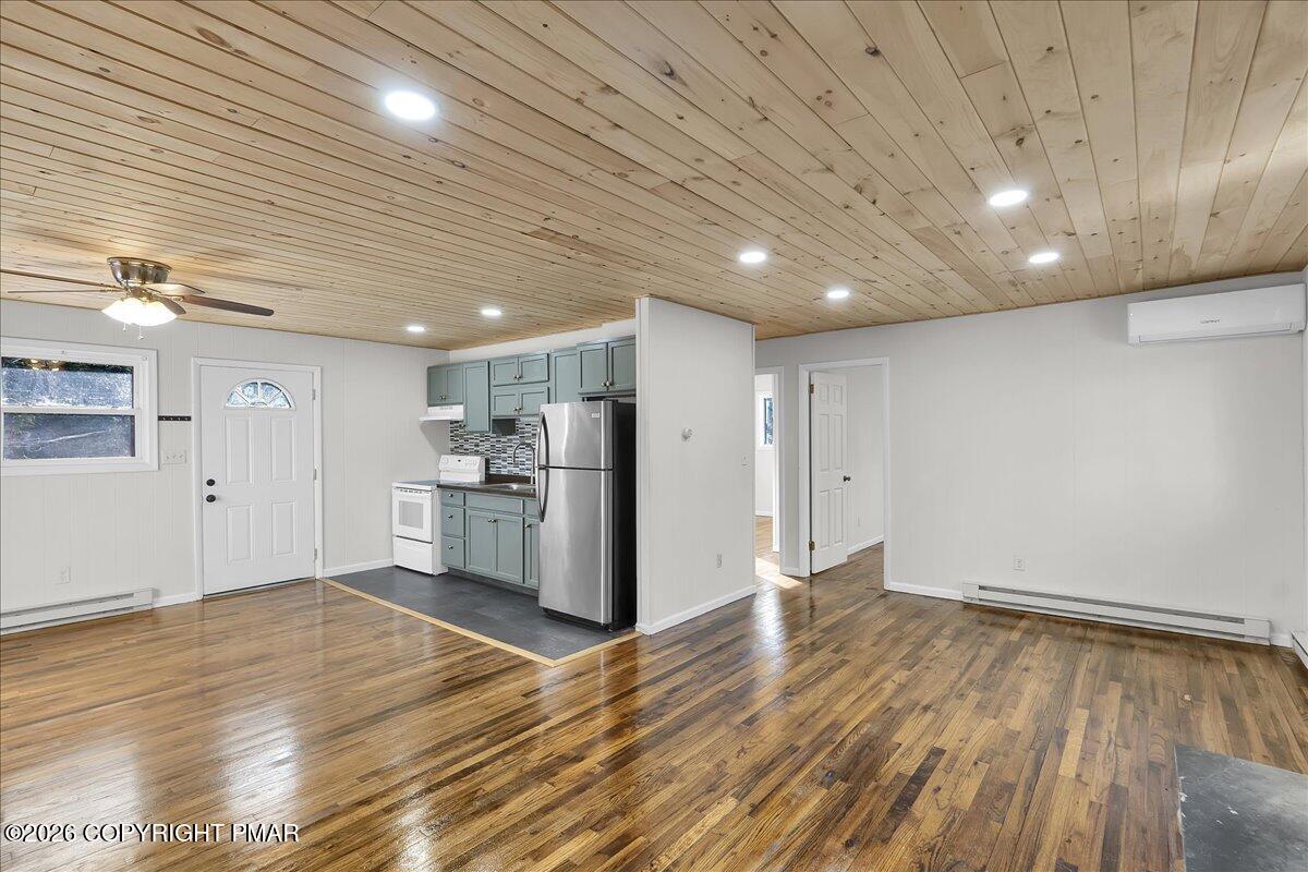 309 Selig Road Pocono Lake, PA 18347 - Photo 7 of 25 a view of a kitchen with wooden floor