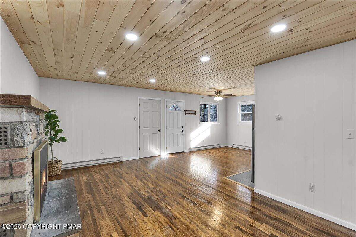 309 Selig Road Pocono Lake, PA 18347 - Photo 8 of 25 a view of empty room with wooden floor