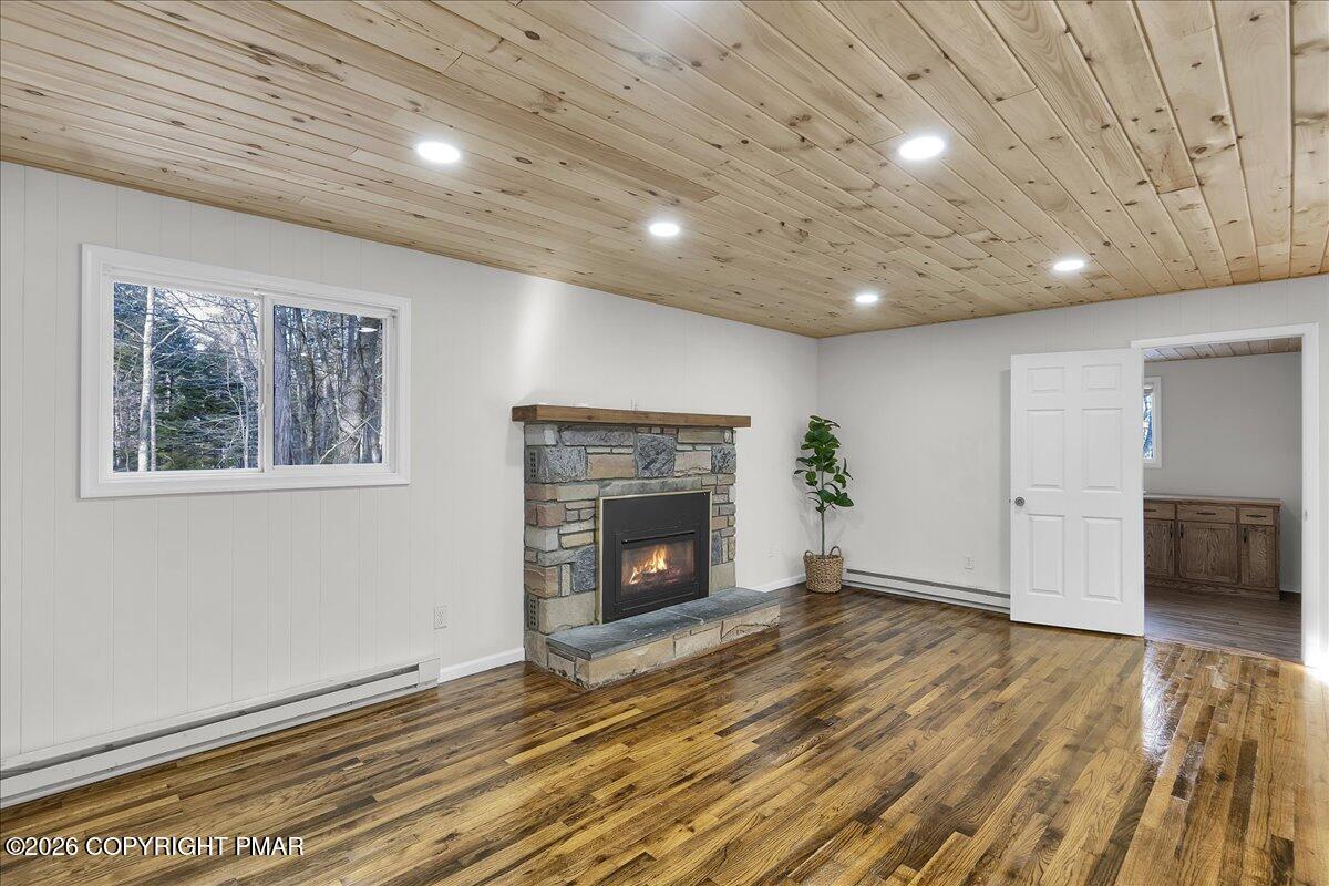 309 Selig Road Pocono Lake, PA 18347 - Photo 9 of 25 a view of an empty room with a fireplace