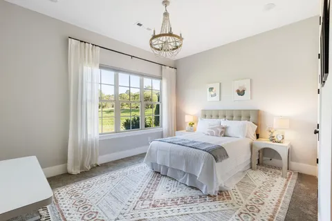 a view of a patio with a table and chairs