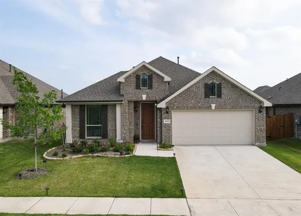 a front view of house with yard
