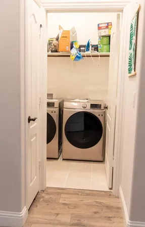 a utility room with dryer and washer