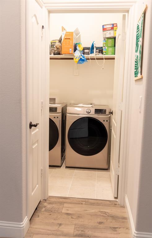 809 Woodview Court Anna, TX 75409 - Photo 11 of 25 a utility room with dryer and washer