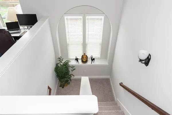 a view of living room with furniture and window