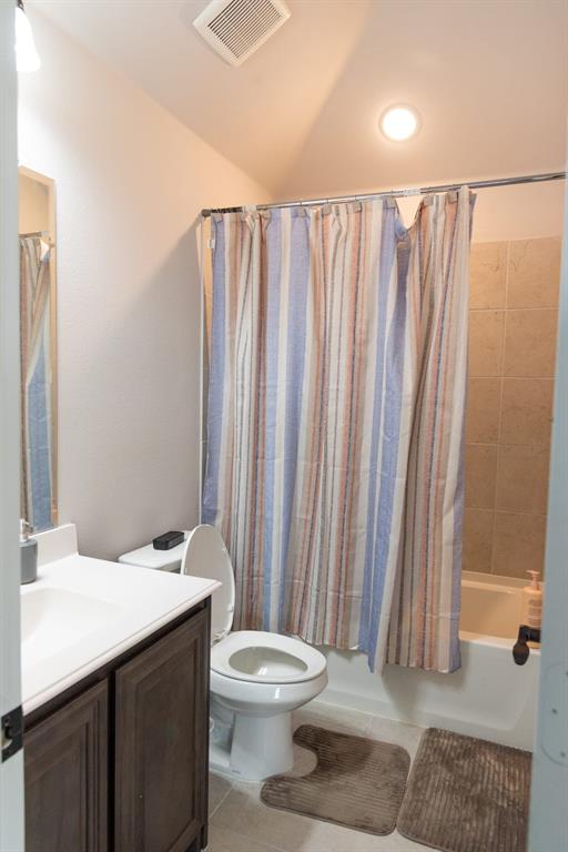 809 Woodview Court Anna, TX 75409 - Photo 21 of 25 a bathroom with a sink a toilet and shower