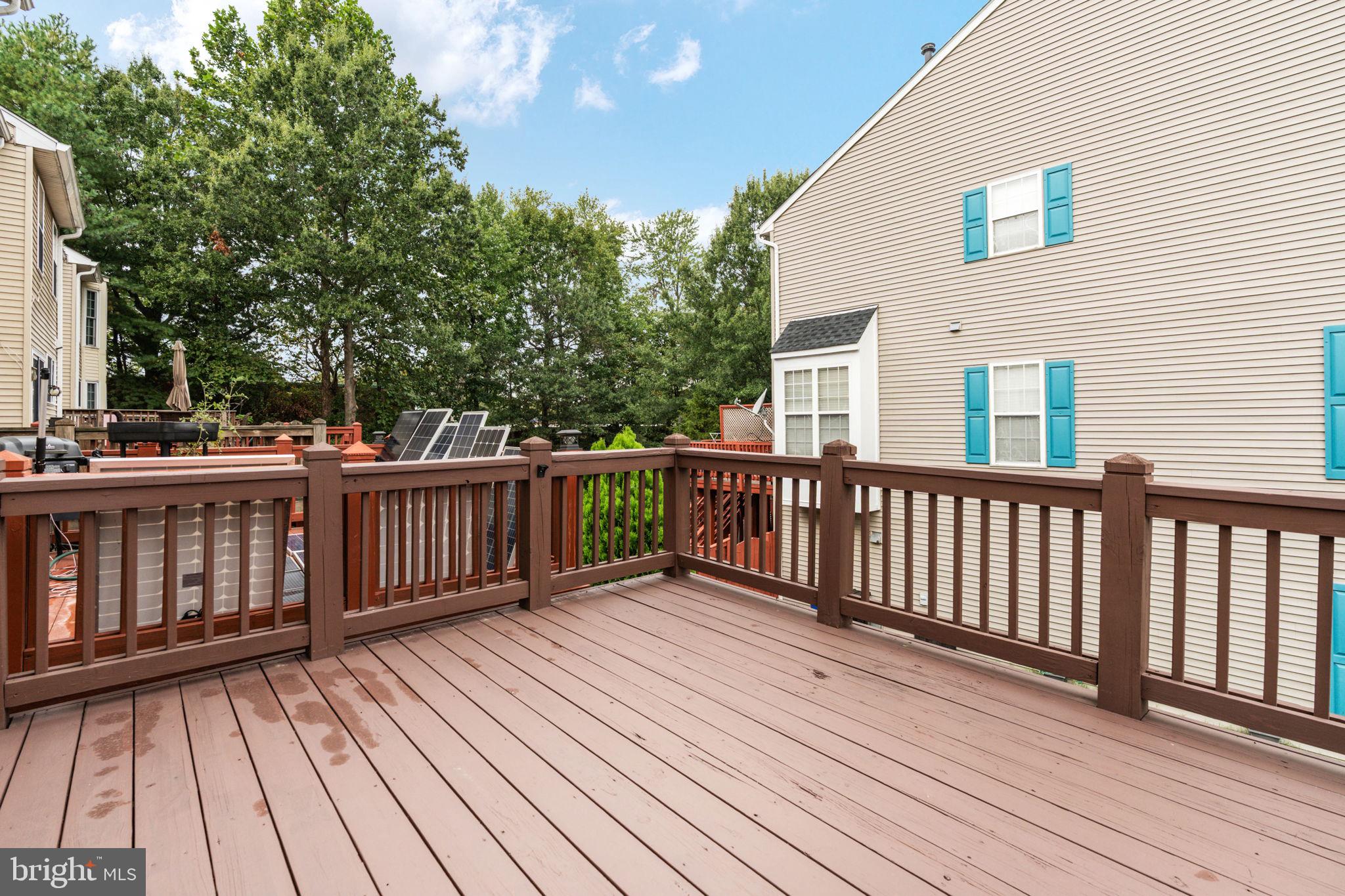 8548 Towne Manor Court Alexandria, VA 22309 - Photo 25 of 53 a view of deck with wooden floor and fence