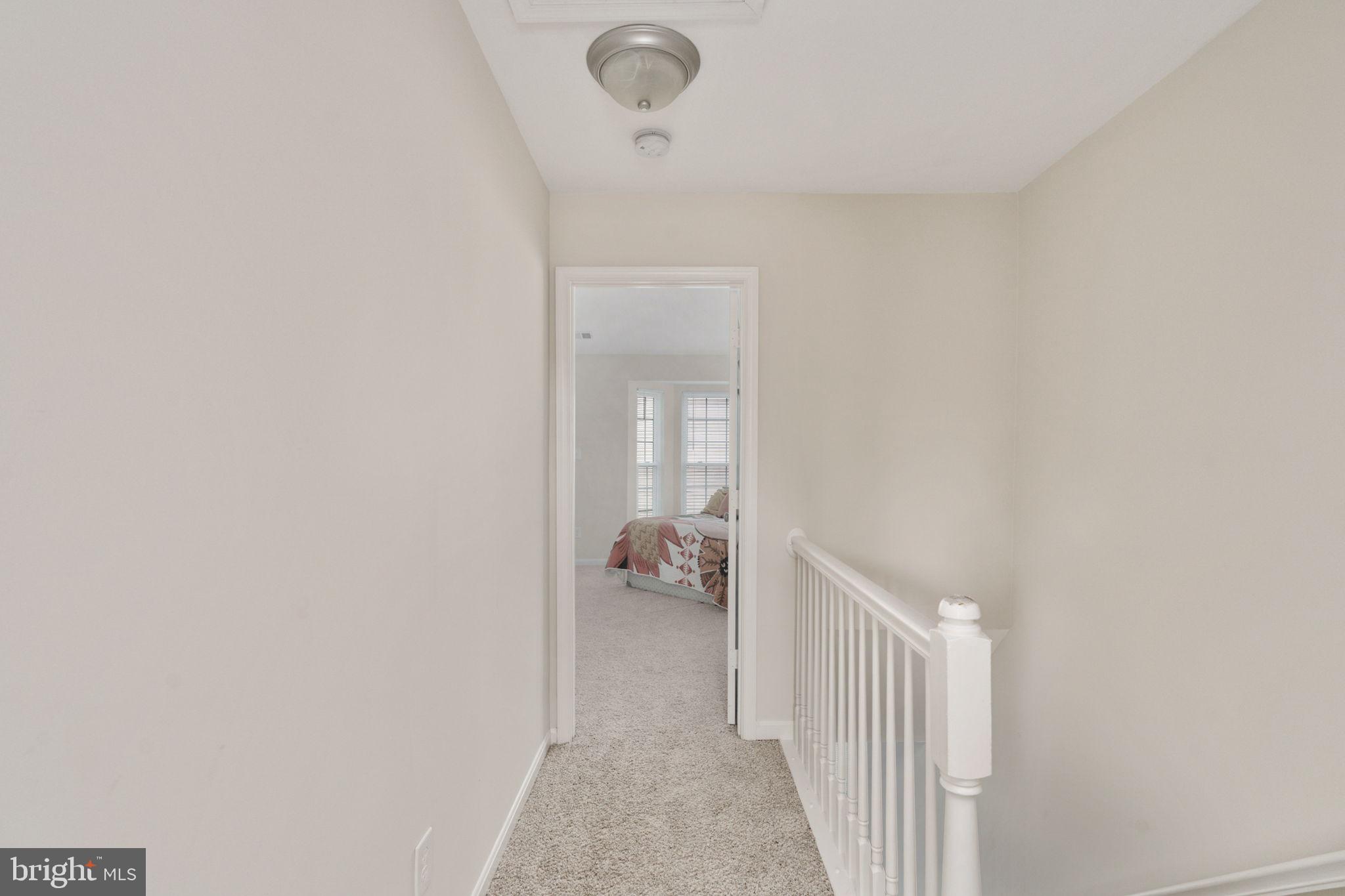 8548 Towne Manor Court Alexandria, VA 22309 - Photo 26 of 53 a view of a hallway