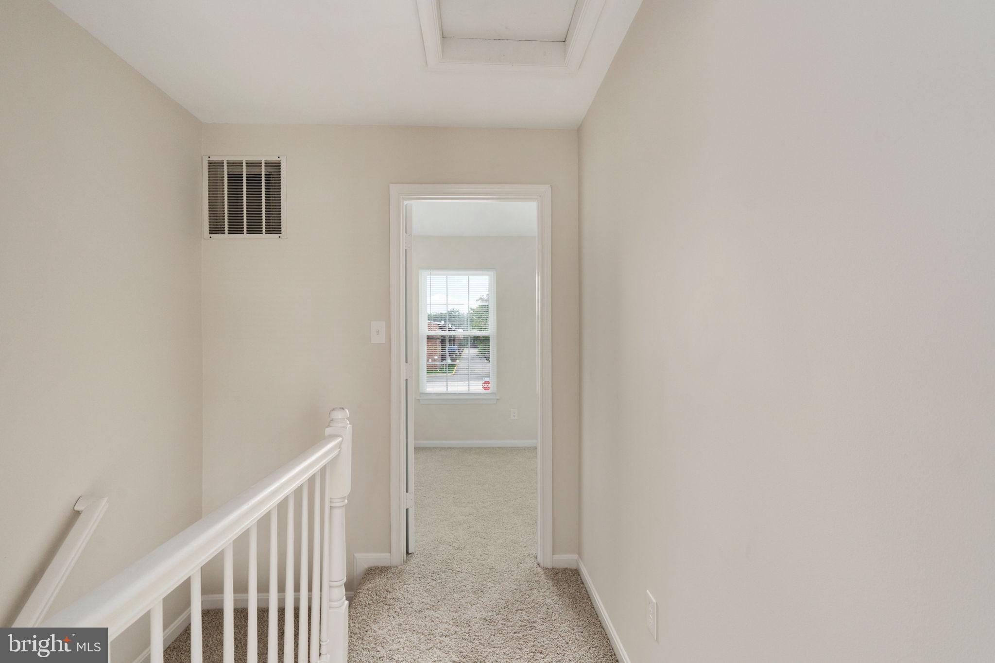 8548 Towne Manor Court Alexandria, VA 22309 - Photo 27 of 53 a view of a hallway