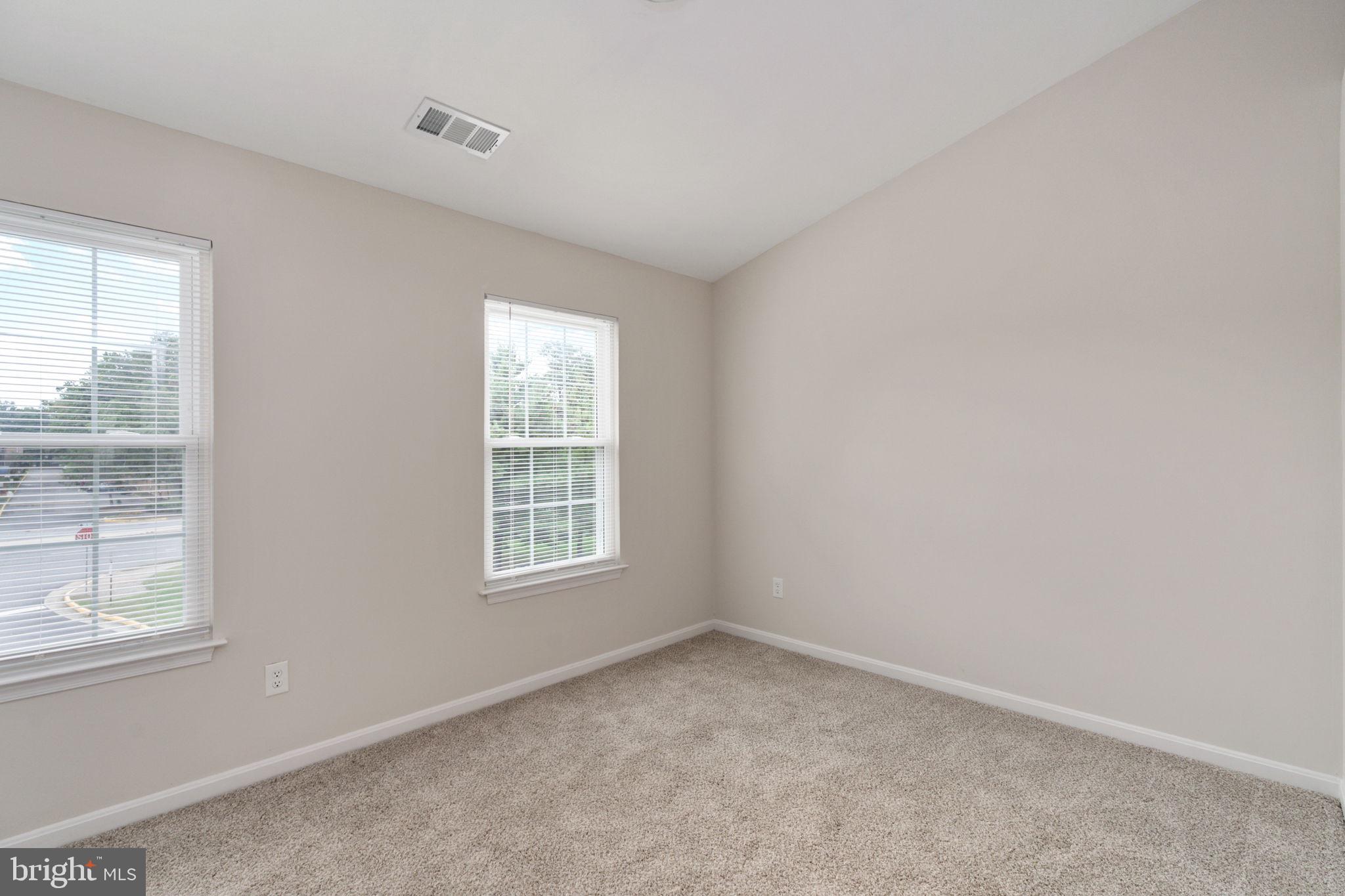 8548 Towne Manor Court Alexandria, VA 22309 - Photo 28 of 53 an empty room with windows