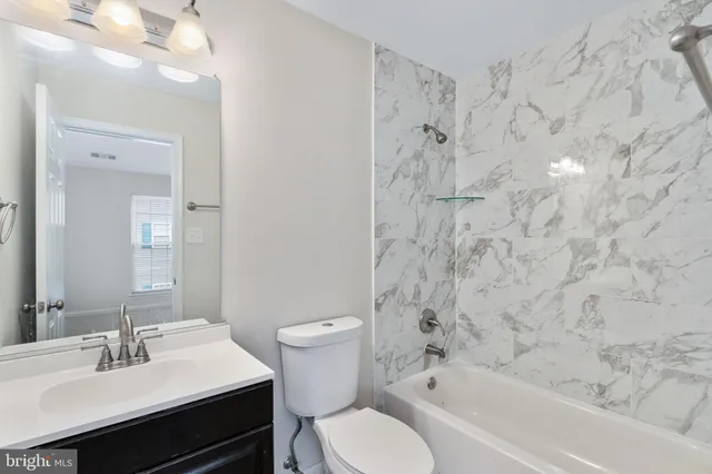 a view of an empty room with stairs