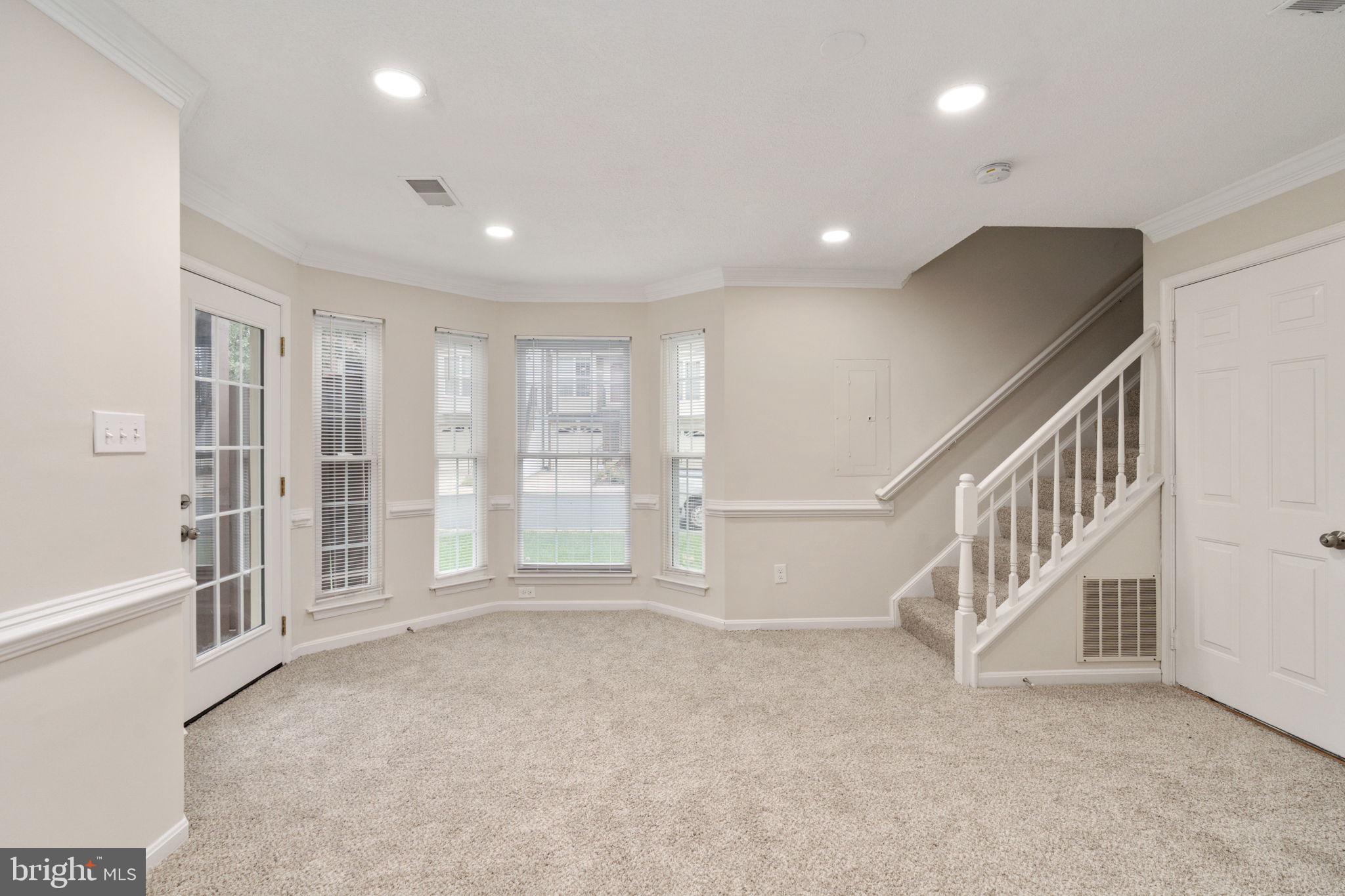 8548 Towne Manor Court Alexandria, VA 22309 - Photo 41 of 53 a view of an empty room with a window