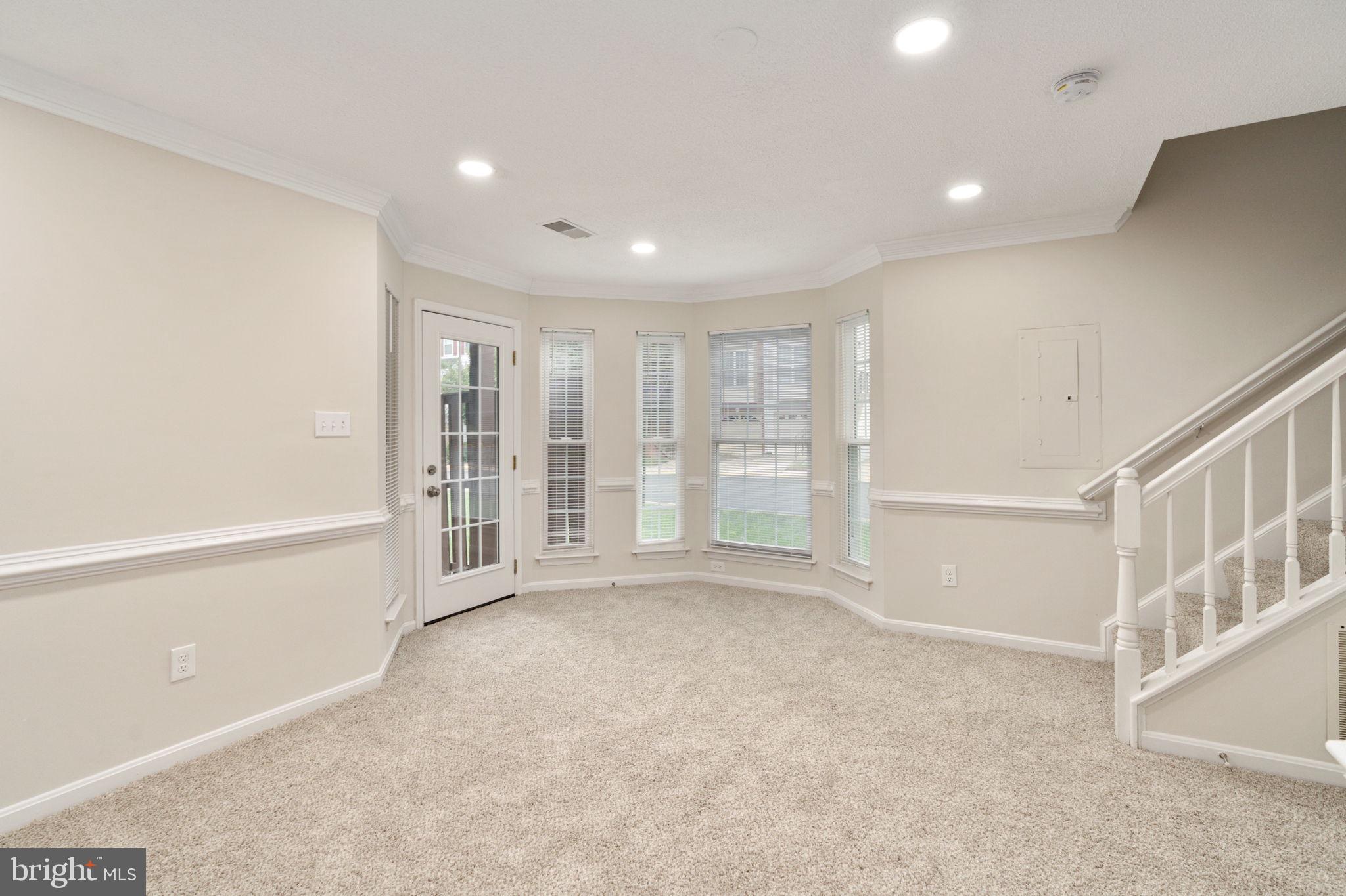 8548 Towne Manor Court Alexandria, VA 22309 - Photo 42 of 53 a view of an empty room with a window