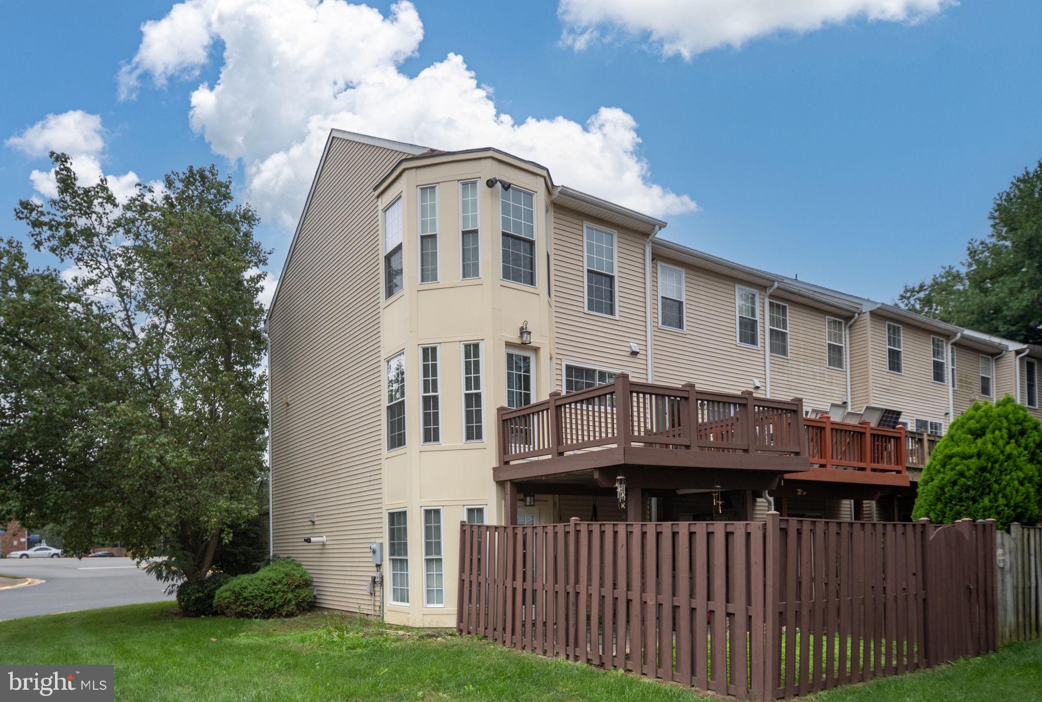 8548 Towne Manor Court Alexandria, VA 22309 - Photo 44 of 53 a view of a house with a yard and plants