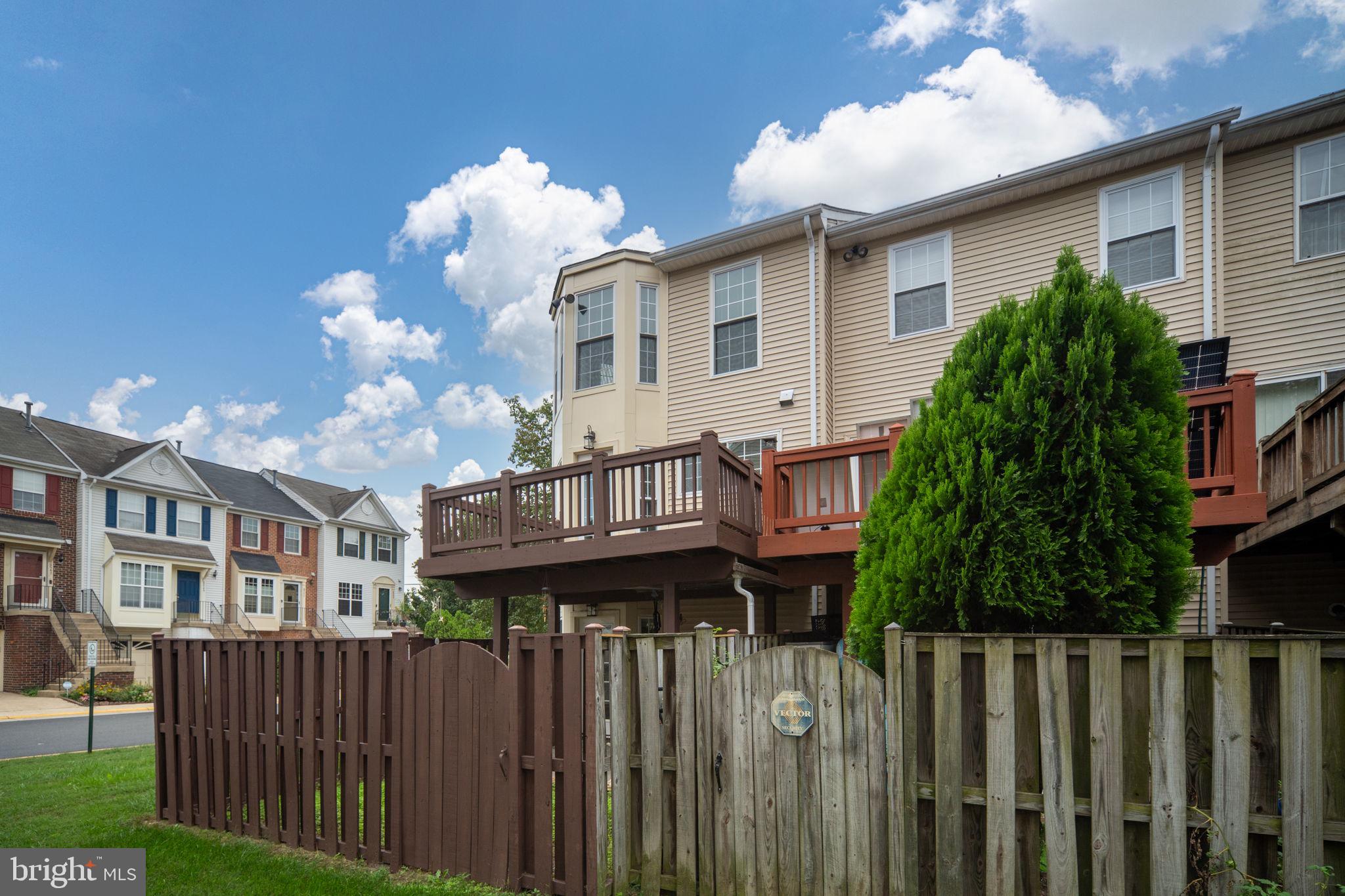 8548 Towne Manor Court Alexandria, VA 22309 - Photo 46 of 53 a view of a house with wooden fence