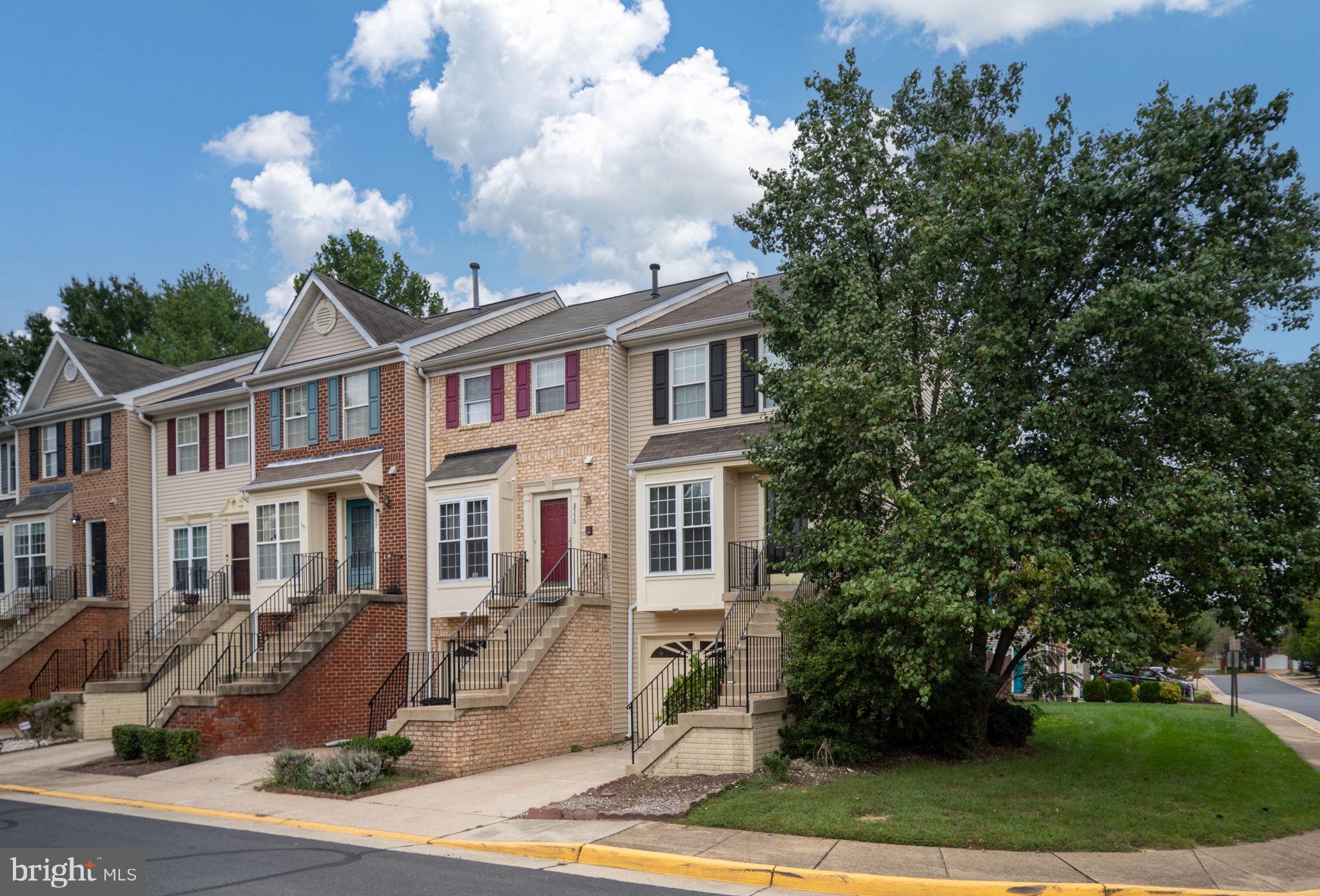 8548 Towne Manor Court Alexandria, VA 22309 - Photo 5 of 53 a front view of a house with a garden