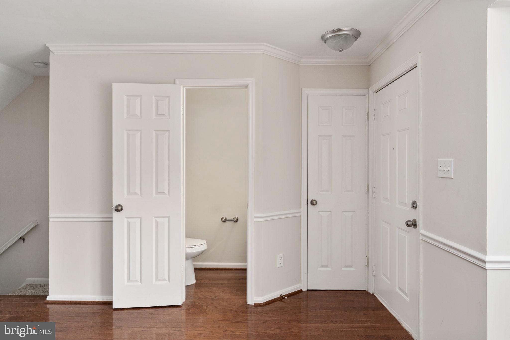 8548 Towne Manor Court Alexandria, VA 22309 - Photo 10 of 53 a view of empty room with wooden floor