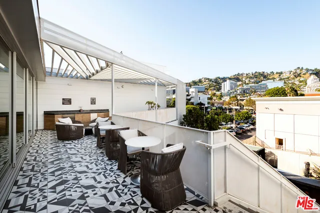 a kitchen with a sink and a stove top oven
