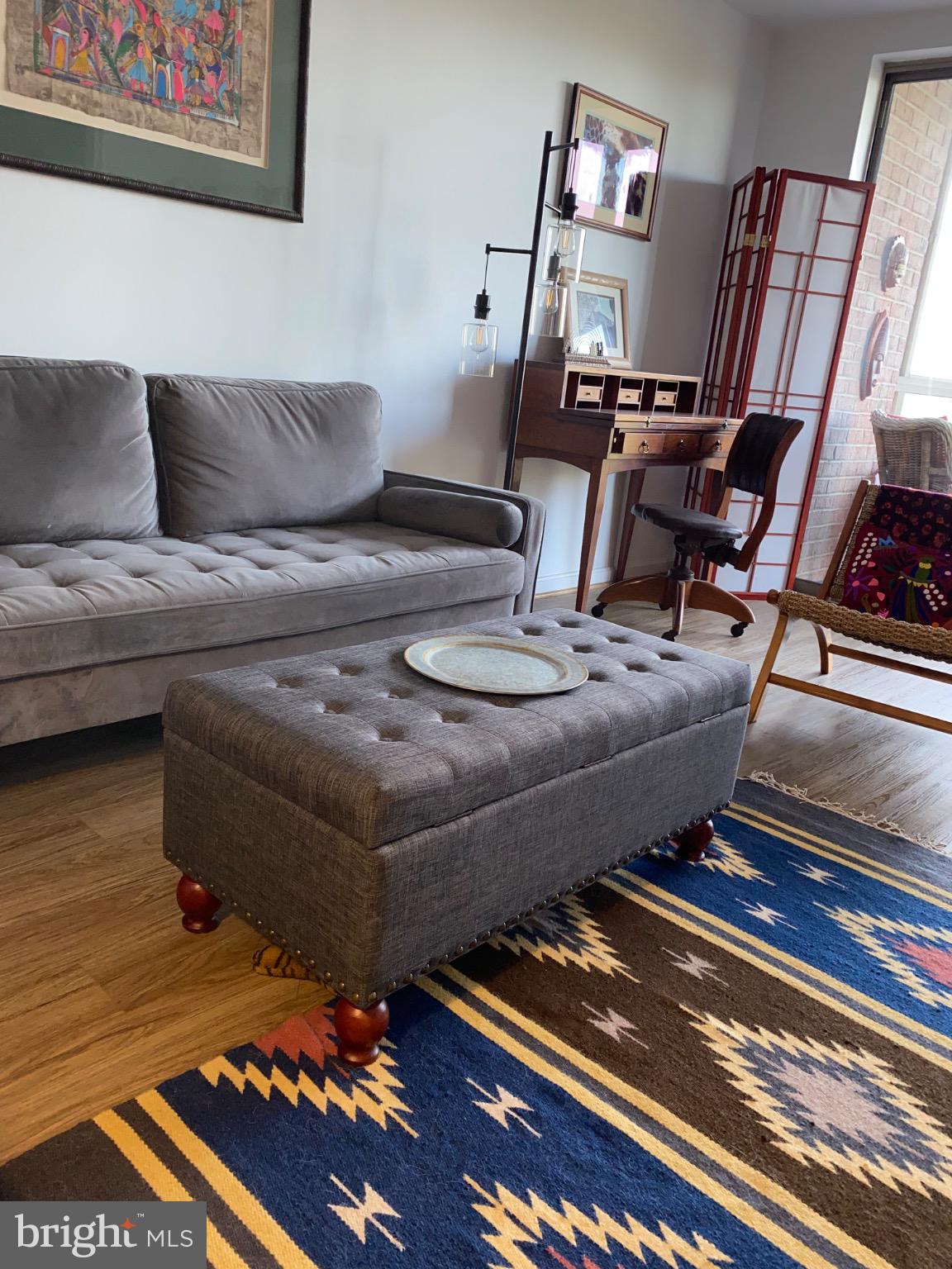 3200 North Leisure World Boulevard, Unit 514 Silver Spring, MD 20906 - Photo 5 of 26 a living room with furniture and a rug