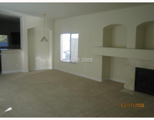 5891 Crumbling Ridge Street Henderson, NV 89011 - Photo 2 of 6 Living Room.