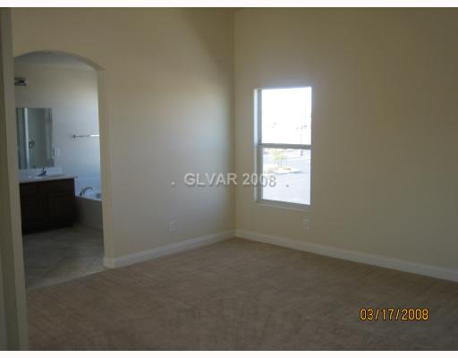 5891 Crumbling Ridge Street Henderson, NV 89011 - Photo 5 of 6 Master Bedroom.