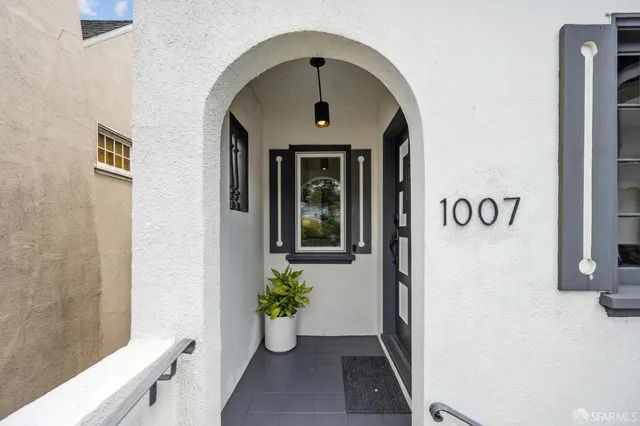 a view of living room and fireplace