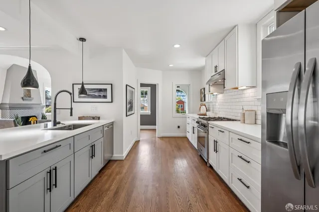 a bedroom with a bed chair and a window