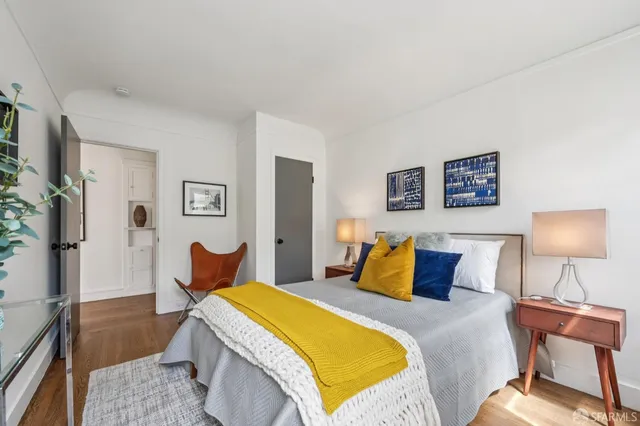 a living room with furniture and a garden