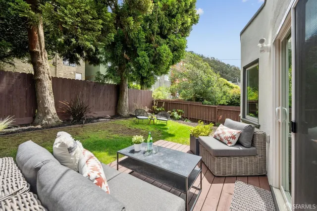 a view of a porch with seating space