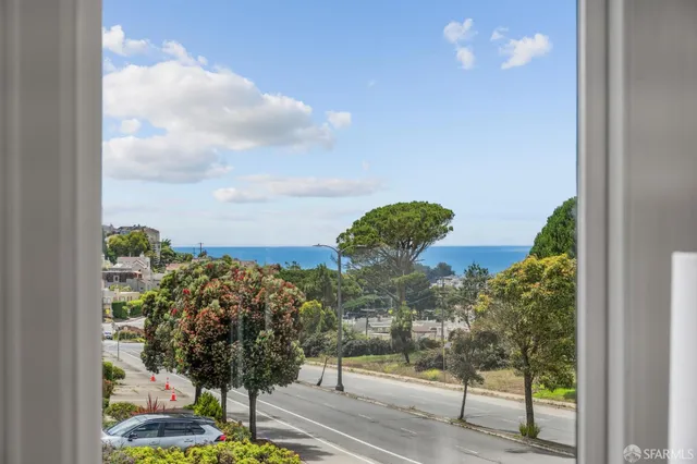 a city view with tall buildings