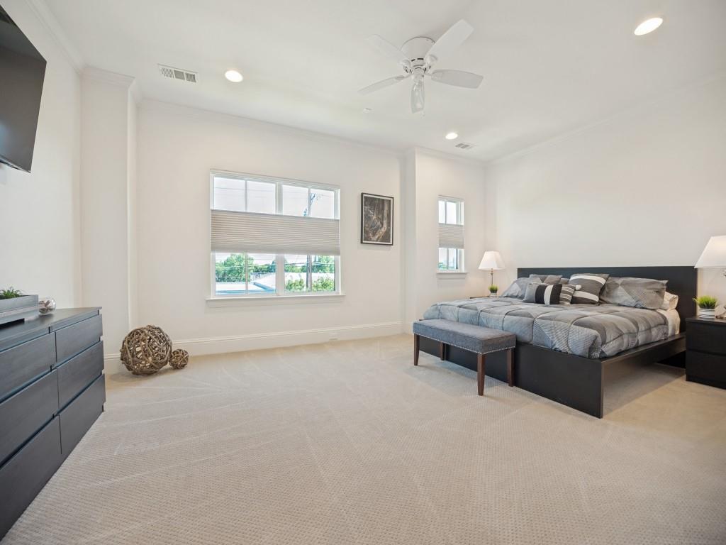 732 West 7th Street Dallas, TX 75208 - Photo 11 of 25 Carpeted room featuring recessed lighting, a ceiling fan, crown molding, and multiple windows with blinds