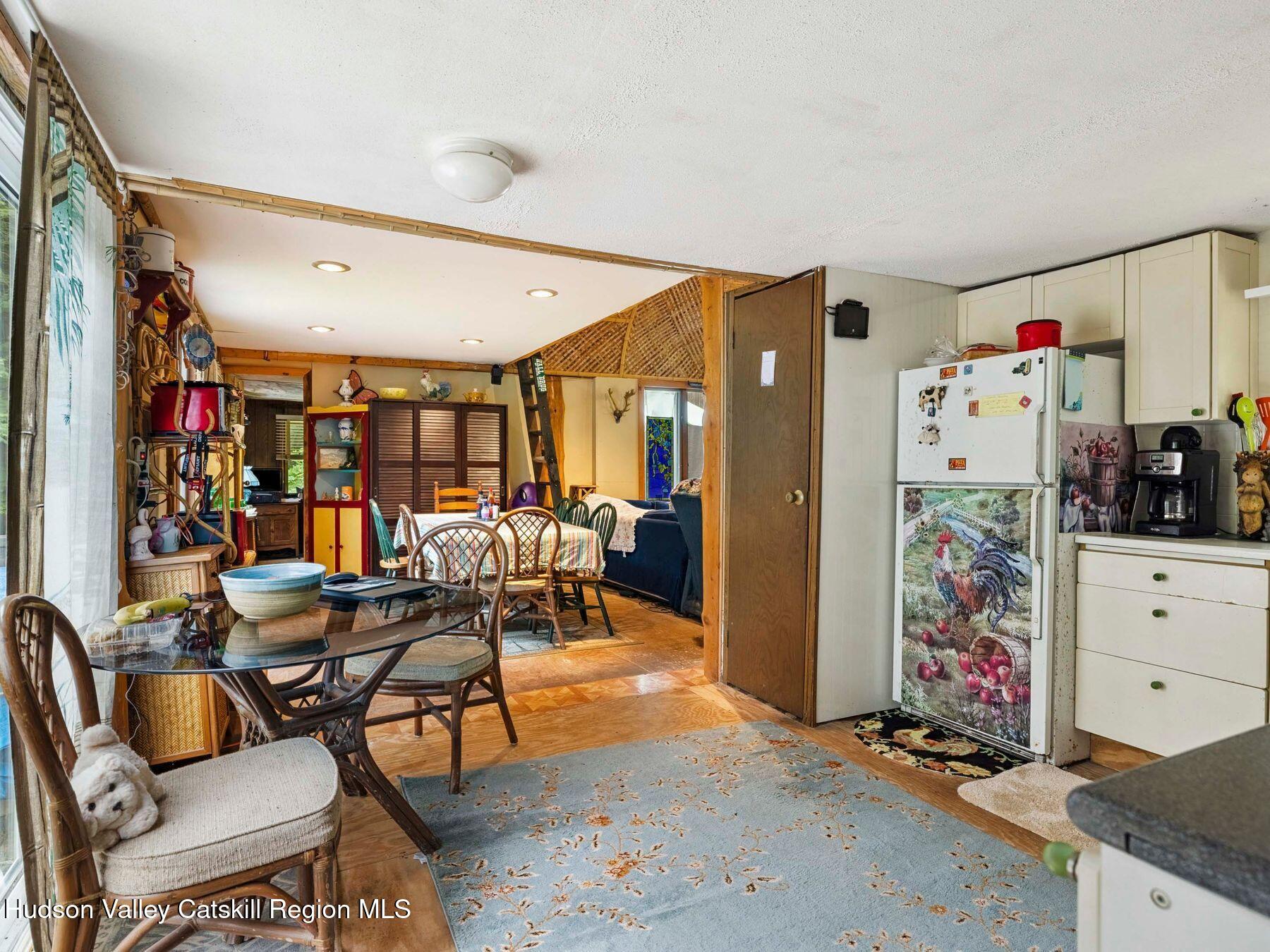 325 Brand Road Conesville, NY 12076 - Photo 15 of 36 a outdoor space with lots of white furniture and shower