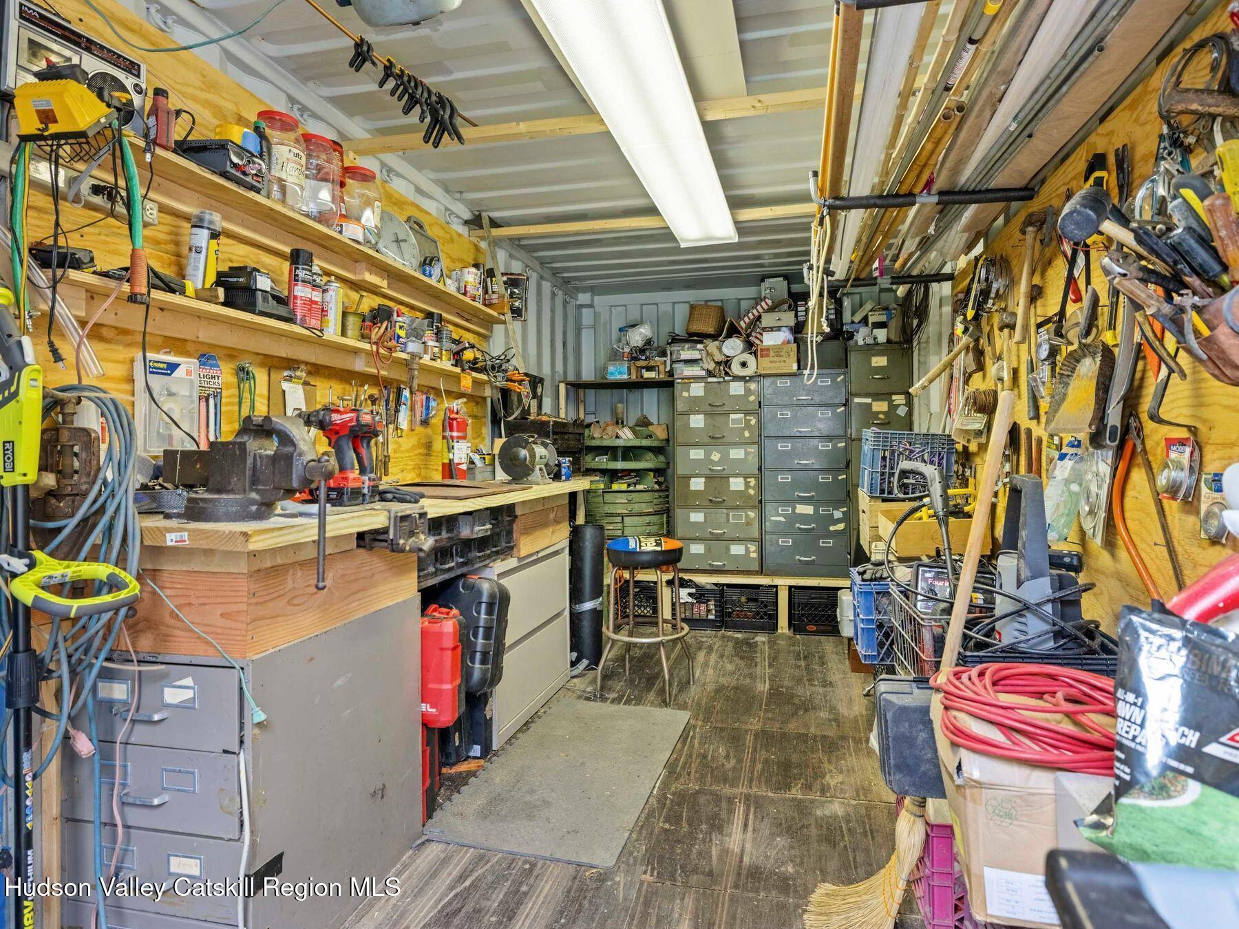 325 Brand Road Conesville, NY 12076 - Photo 30 of 36 a store with an outdoor seating