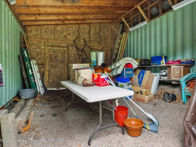 a backyard of a house with seating space
