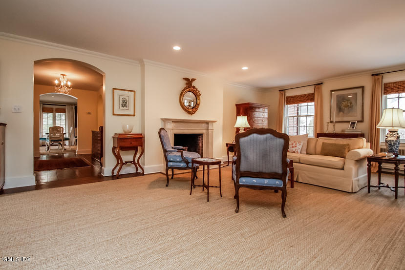 35 Willow Road Riverside, CT 06878 - Photo 9 of 35 a living room with furniture and a fireplace