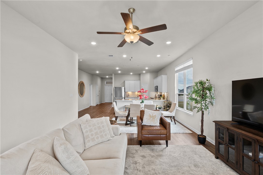 1932 Viva Road Bryan, TX 77807 - Photo 17 of 38 Living room featuring recessed lighting, light wood-style floors, and a ceiling fan