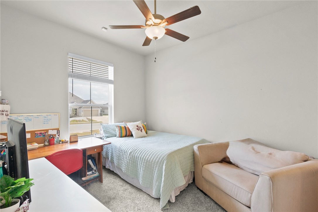 1932 Viva Road Bryan, TX 77807 - Photo 28 of 38 Bedroom 4 with ceiling fan & walk in closet