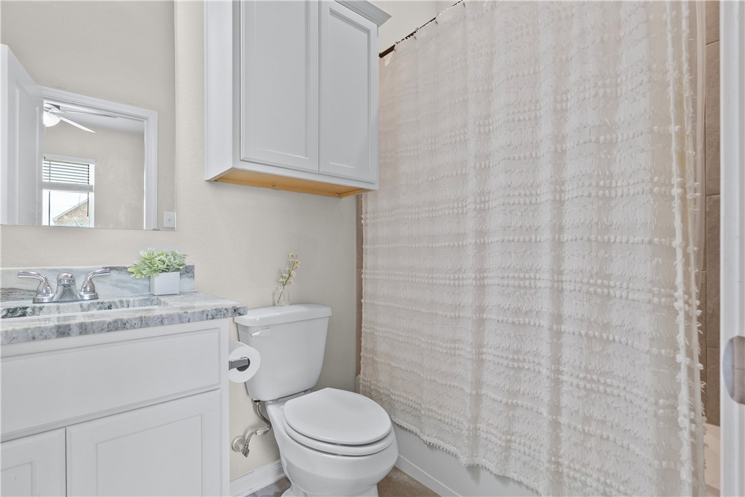 1932 Viva Road Bryan, TX 77807 - Photo 29 of 38 Bathroom connected to bedroom #4 with granite & tiled shower