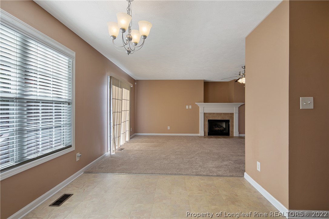 38 Rockingham Street Spring Lake, NC 28390 - Photo 16 of 50 a view of a livingroom with a fireplace