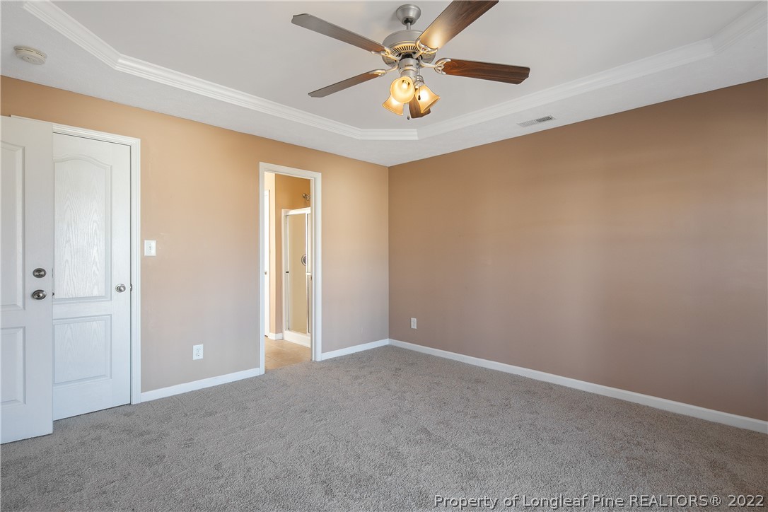 38 Rockingham Street Spring Lake, NC 28390 - Photo 26 of 50 an empty room with chandelier fan