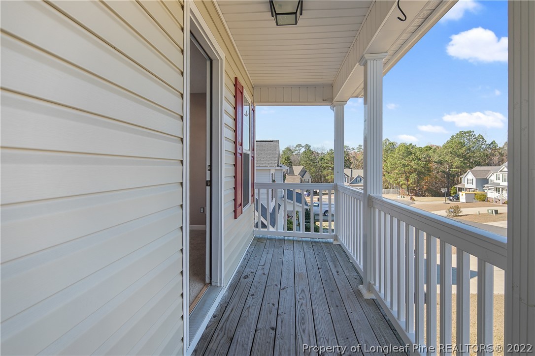 38 Rockingham Street Spring Lake, NC 28390 - Photo 27 of 50 a view of a balcony with wooden floor