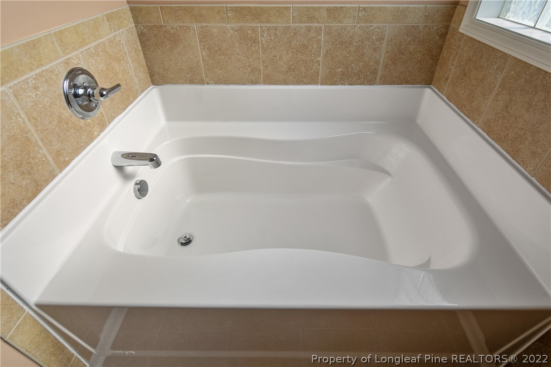 38 Rockingham Street Spring Lake, NC 28390 - Photo 31 of 50 a bathroom with a bathtub