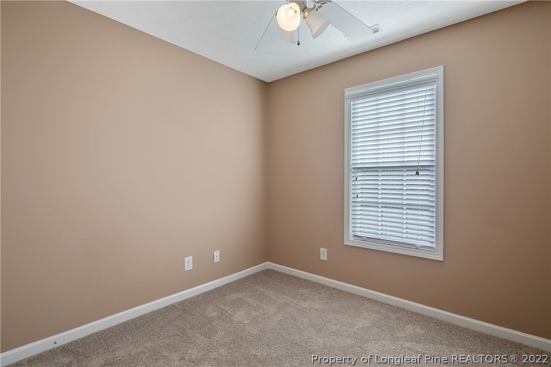38 Rockingham Street Spring Lake, NC 28390 - Photo 32 of 50 an empty room with a window