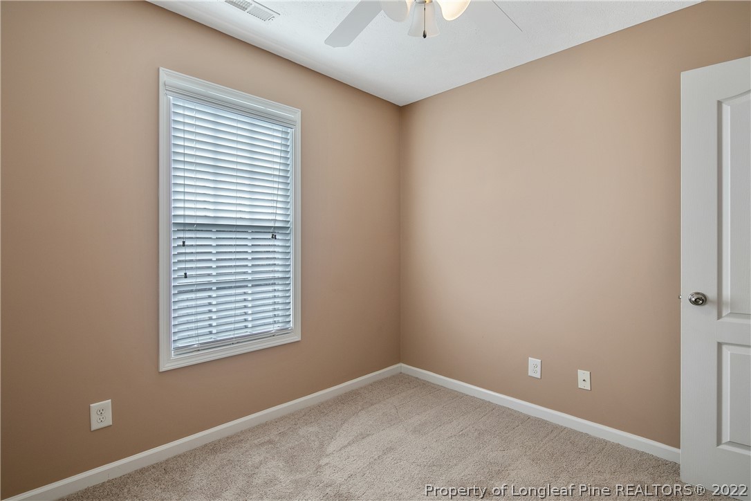 38 Rockingham Street Spring Lake, NC 28390 - Photo 33 of 50 an empty room with windows