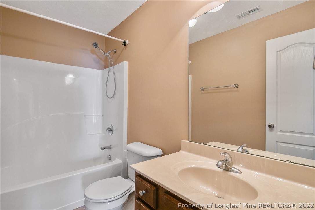 38 Rockingham Street Spring Lake, NC 28390 - Photo 36 of 50 a bathroom with a sink toilet and shower