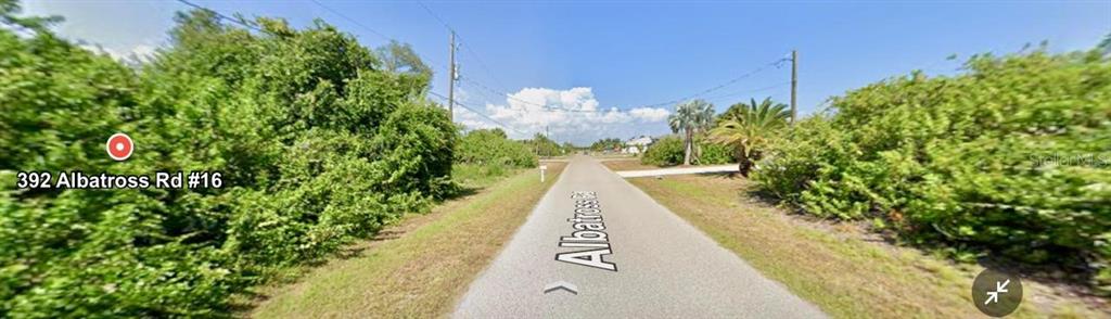 392 Albatross Road Rotonda West, FL 33947 - Photo 3 of 7 a view of a garden