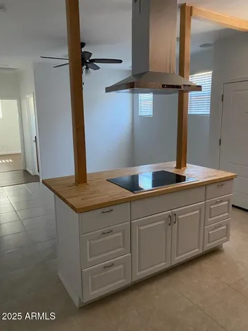 a bathroom with a sink and vanity