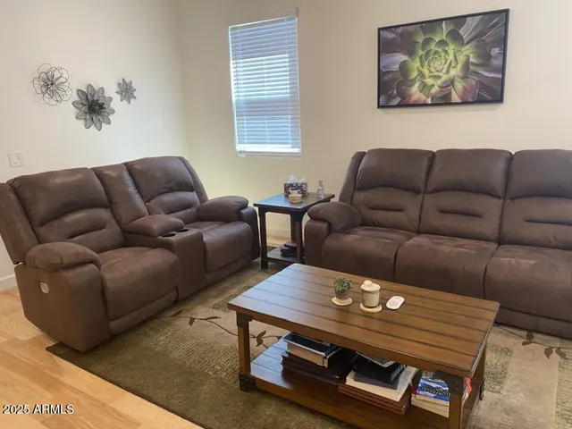 a living room with furniture and a couch