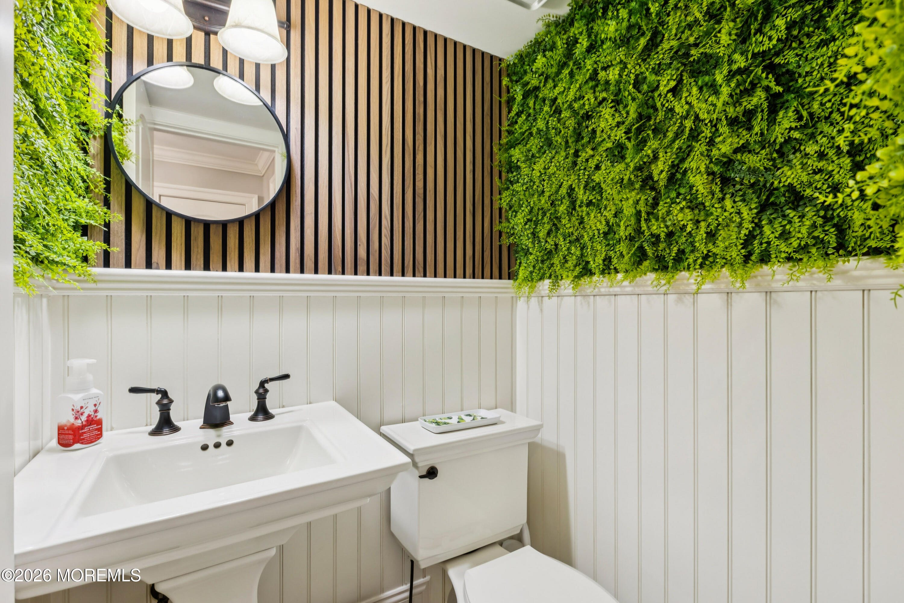 40 Pinyon Street Howell, NJ 07731 - Photo 19 of 29 a bathroom with a sink a toilet and a mirror