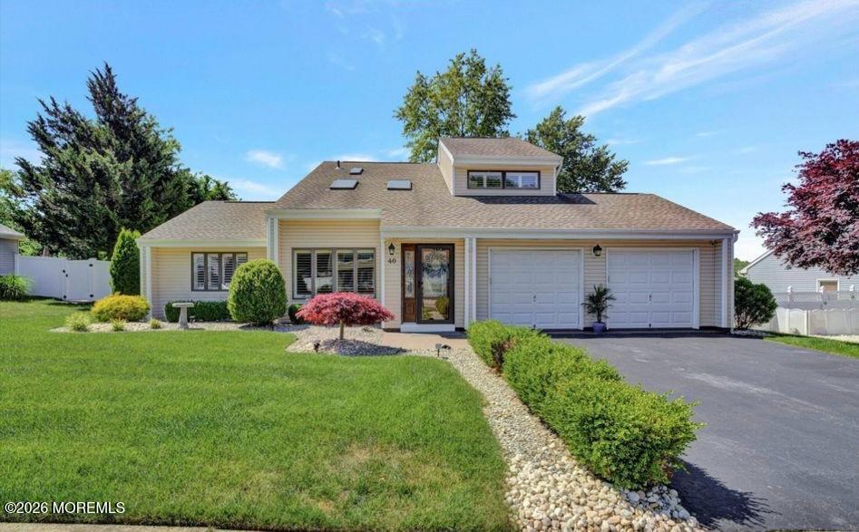 40 Pinyon Street Howell, NJ 07731 - Photo 2 of 29 a front view of a house with a yard and porch